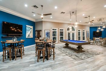 Resident lounge with social area and gaming tables